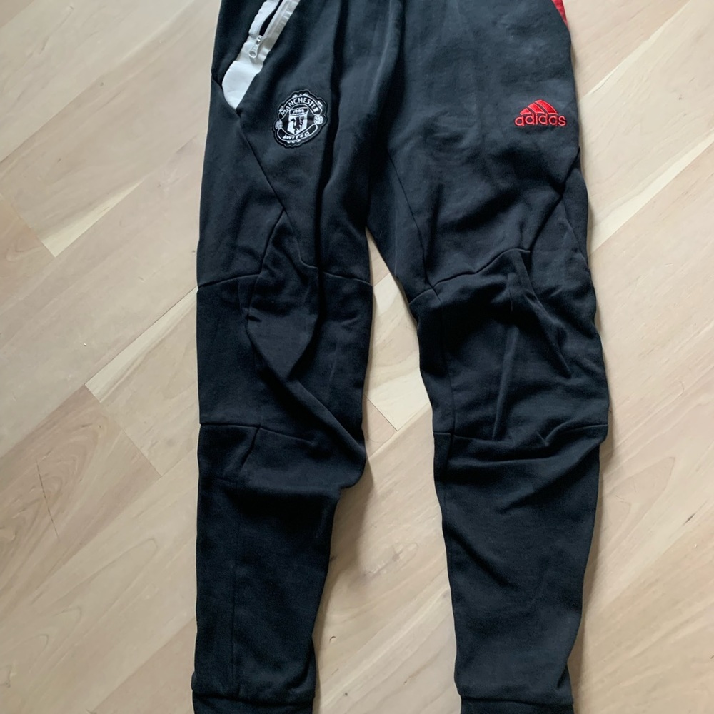 Black Adidas men’s sweatpants.